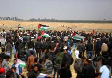 فلسطينيون مشاركون في مسيرة العودة على حدود غزة