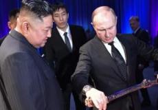 بوتن والزعيم الكوري كيم.