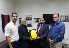 المحافظ أبو النجا يزور الممثلية الفرنسية بغزة مهنئا بكأس العالم.jpg