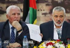 رئيس المكتب السياسي لحركة حماس إسماعيل هنية وعضو اللجنة التنفيذية لمنظمة التحرير واللجنة المركزية لحركة فتح عزام الأحمد