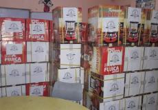 توزع طرود غذائية على آلاف الأسر في غزة