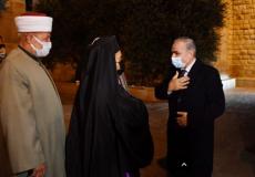 محمد اشتية خلال مشاركته في عشاء عيد الميلاد 