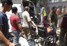 توزيع مساعدات على المعاقين