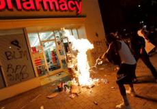 احتجاجات أمريكا .. اعتقال المئات وفرض حظر تجوال في 25 مدينة