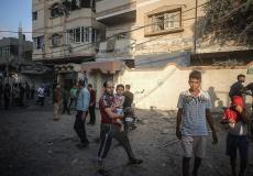 لحظة اخلاء المواطنين من قرب مبنى المسحال الثقافي غرب غزة أمس