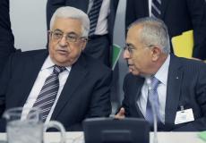 سلام فياض الرئيس السابق للحكومة الفلسطينية والرئيس محمود عباس من الارشيف
