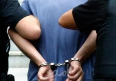 قوات الشرطة تعتقل سائق- تعبيرية