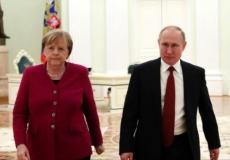 بوتن وميركل