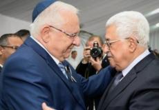 الرئيس الفلسطيني محمود عباس والإسرائيلي رؤوفين ريفلين -ارشيف-