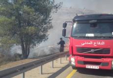 سيارة إطفائية تطفئ حريق