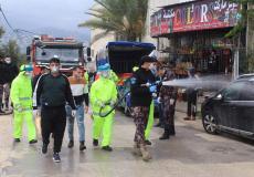 تعقيم أماكن تواجد بها المصاب بكورونا في نابلس