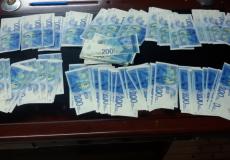 شرطة رام الله تضبط مبلغ 40 الف شيكل مزيفه