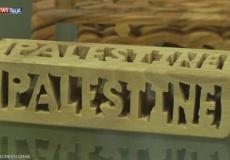 فلسطينية تبدع ابتكارات من خشب الزيتون
