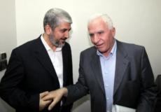 عزام الأحمد وخالد مشعل -ارشيف-