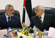 الرئيس الفلسطيني محمود عباس ورئيس حركة حماس اسماعيل هنية -من الارشيف-