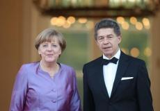 المستشارة الألمانية أنغيلا ميركل مع زوجها