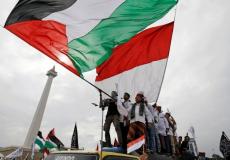 علمي فلسطين وإندونيسيا- أرشيفية