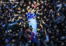 لحظة وصول جثمان الشهيد الصحفي أحمد أبو حسين