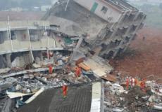 مفقودين بانهيار مبنى بالصين