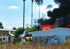 حريق كبير في الخضيرة وانهيار مبنيين