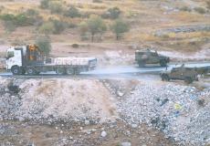 الاحتلال يستولي على كميات كبيرة من الحجر وطوب البناء