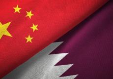علمي الصين وقطر 