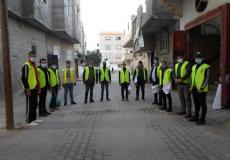 لجنة الطوارئ بالمغازي توزع ملصقات حول مخاطر كورونا