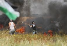 فلسطينيون مشاركون في مسيرة العودة على حدود غزة