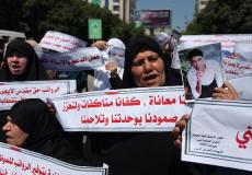 إحدى النساء اللواتي شاركن في الاحتجاج على عدم صرف رواتب موظفي غزة