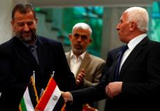 عزام الأحمد ويحيى السنوار وصالح العاروري في القاهرة -ارشيف-