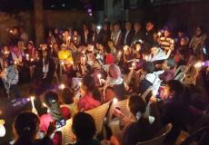  أشبال وزهرات فتح  يوقدون شموعاً في بيت الشهيد أبو عمار 