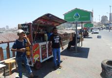 وزارة النقل والمواصلات تقوم بتنظيم عمل البسطات العشوائية داخل الميناء