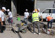 أعمال تعزيل وتنظيف مصارف مياه الأمطار في شارع صلاح الدين (19).JPG