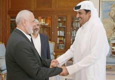 أمير قطر واسماعيل هنية في لقاء سابق - ارشيف