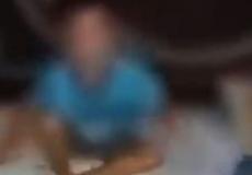 مشهد من فيديو تعنيف طفل في لبنان