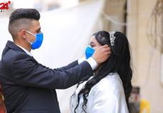 "قصي ومي" عروسان يقيمان حفل زفاف رغم غياب أفراد العائلة بسبب كورونا