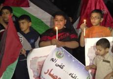 أطفال في غزة يطالبون برفع الحصار عن غزة -ارشيف-