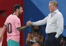 مدرب برشلونة كومان والنجم  الأرجنتيني ليونيل ميسي