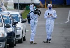 صحفيون يغطون أزمة فيروس كورونا  - توضيحية