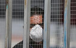 شخص يرتدي الكمامة في غزة كإجراء وقائي من الإصابة بفيروس كورونا- تعبيرية