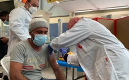 تطعيم لقاح كورونا للعمال الفلسطينيين