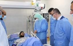 حمد والهدري يزوران جرحى العدوان على غزة والضفة في مجمع فلسطين الطبي
