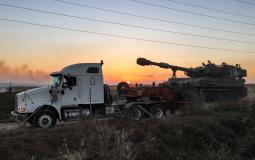 شاحنة تحمل دبابة إسرائيلية قبر حدود غزة