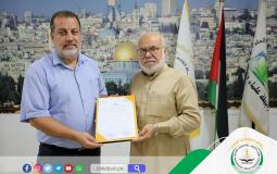 جانب من توقيع اتفاقية التعاون بين الجهتين