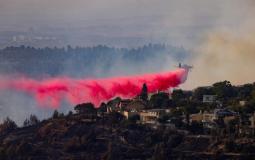 محاولات الطائرات إطفاء الحرائق في جبال القدس اليوم