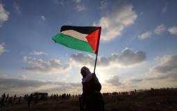 فلسطينية تشارك في تظاهرة قرب حدود غزة