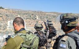 عناصر الجيش والشرطة الاسرائيلية قرب بؤرة أفيتار