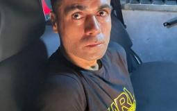 محمود العارضة لحظة اعتقاله أمس الجمعة