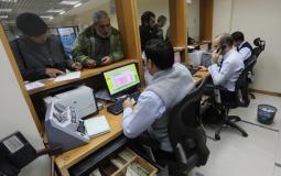 اتفاق مصري قطري على دفع رواتب موظفي غزة - أرشيف