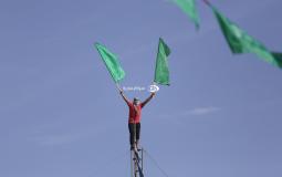 أنصار حركة حماس خلال مسير في ذكرى الإنطلاقة الـ34 للحركة